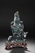 A SPINACH JADE 'LIU HAI AND TOAD' VASE