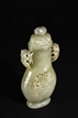 A YELLOW JADE OPENWORKS CARVED BOTTLE VASE WITH LID