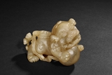 A SHOUSHAN STONE CARVED BUDDHIST LION