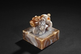 AN AGATE CARVED MYTHICAL BEAST STAMP SEAL