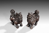 A PAIR OF SUANZHI WOOD CARVED MYTHICAL BEASTS