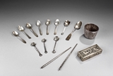 A SET OF VINTAGE SILVER UTENSILS