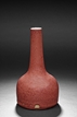 A CORAL-RED GLAZED MALLET-SHAPED VASE
