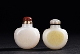 A PAIR OF WHITE JADE SNUFF BOTTLES