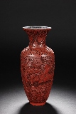 A CINNABAR LACQUER FIGURES VASE