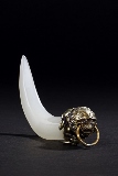A WHITE JADE MODEL OF TUSK