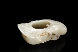 A WHITE JADE 'DUCK' WASHER