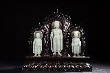 A SET OF THREE WHITE JADE BODHISATTVAS