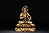 A GILT-BRONZE FIGURE OF TIBETAN JAMBHALA