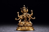 A GILT-BRONZE FIGURE OF USHNISHAVIJAYA