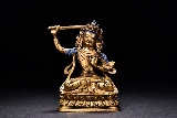A GILT-BRONZE FIGURE OF MANJUSRI