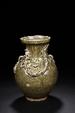 A YUE WARE CELADON 'DRAGON' VASE
