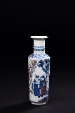 A SMALL UNDERGLAZE BLUE AND COPPER RED VASE