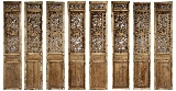 A SET OF EIGHT WOOD DOOR PANELS