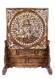A LARGE CARVED HARDWOOD #CARPS# FLOOR SCREEN