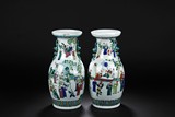 A PAIR OF WUCAI FIGURES VASES