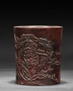 A CARVED HUANGHUALI BRUSH POT