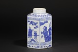 A BLUE AND WHITE HEXAGONAL JAR