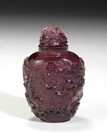A PURPLE COLOR CARVED GLASS SNUFF BOTTLE