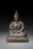 A BRONZE DALAI LAMA STATUE