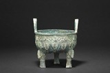 AN ARCHAIC BRONZE RITUAL VESSEL, DING