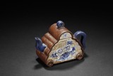 A PAINTED YIXING ZISHA STONEWARE TEAPOT