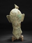 AN ARCHAIC BRONZE HEAD STATUE