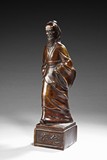 A BRONZE FIGURE OF HUA TUO