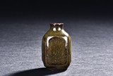 A CHINESE TEA DUST GLAZE SNUFF BOTTLE