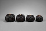 A SET OF FOUR ZITAN CARVED ‘EIGHT EMBLEMS' JARS