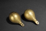 TWO BRONZE BALANCE WEIGHTS