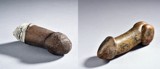 A GROUP OF TWO STONE CARVED PENISES