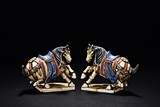 A PAIR OF PAINTED IVORY HORSE SEALS