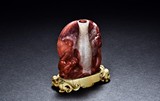 A CARNELIAN AGATE 'CHILONG' INCENSE HOLDER WITH IVORY STAND
