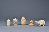 A SET OF IVORY SNUFF CARVINGS