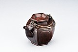 A YIXING RED CLAY HEXAGONAL TEAPOT WITH HANDLE