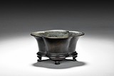 A BRONZE FLOWER SHAPED CENSER
