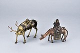 A PARCEL GILT DEER AND GILT DECORATED BRONZE HORSE FIGURE