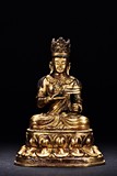 A GILT BRONZE FIGURE OF BODHISATTVA