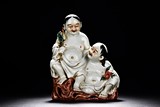 A FAMILLE ROSE PORCELAIN FIGURAL GROUP