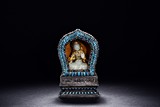 AN IMPORTANT GEMS INLAID SILVER SHRINE ACCOMMODATING WHITE JADE BODHISATTVA