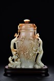 A LARGE WHITE JADE CARVED 'PLUM' VASE