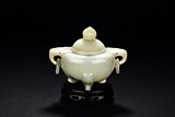 A CELADON JADE TRIPOD CENSER