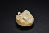 A WHITE JADE OPENWORK 'PEACH' INCENSE BAG