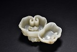 A WHITE JADE CARVED 'DOUBLE LINGZHI' WASHER