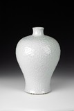A MOULDED WHITE GLAZED MEIPING VASE