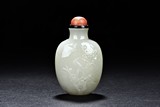 A WHITE JADE 'MAGPIE UPON PLUM' SNUFF BOTTLE