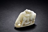 A WHITE JADE CARVED FIGUREL GROUP