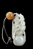 A WHITE JADE CARVED GOURD PENDANT