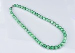 A NATURAL JADEITE BEAD NECKLACES